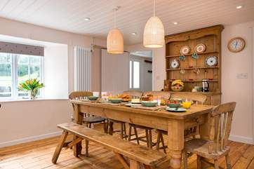 Plenty of room for everyone around the dining-table, making holiday meal times a real treat.