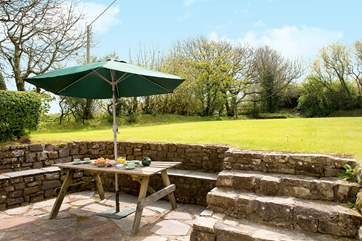 The garden is mainly laid to lawn, making it ideal for young and old alike.