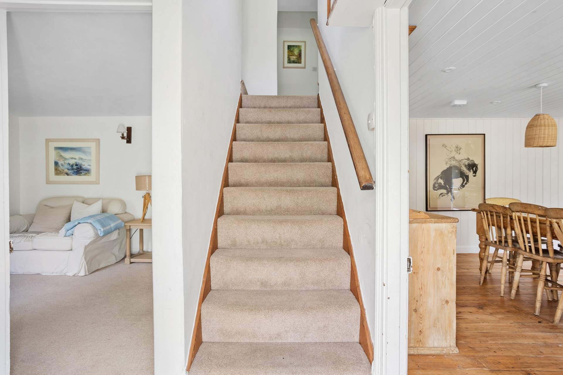 Head across the entrance hall and you will find two sitting room areas.