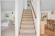 Head across the entrance hall and you will find two sitting room areas.