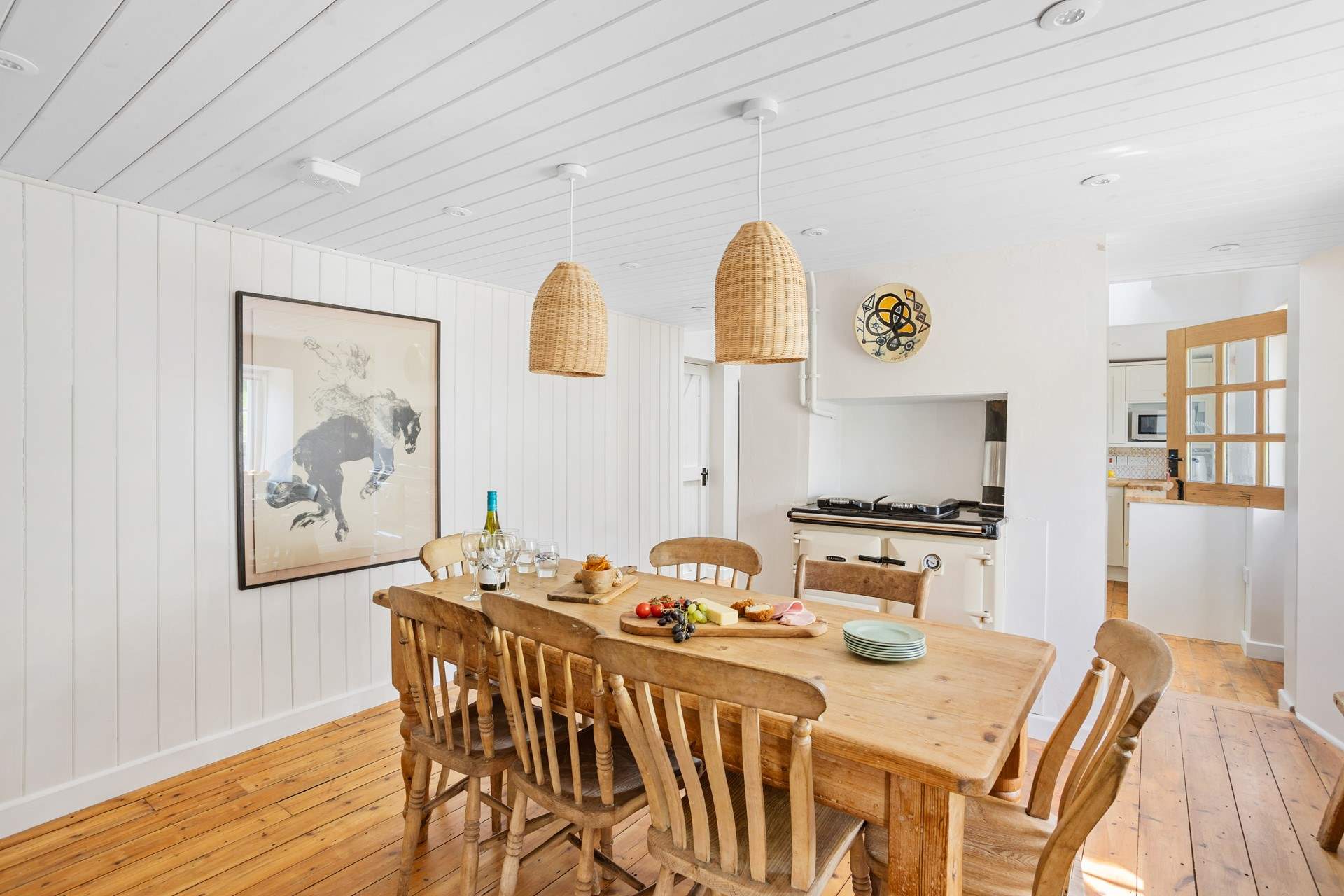 This social room dinning area links through to the kitchen.