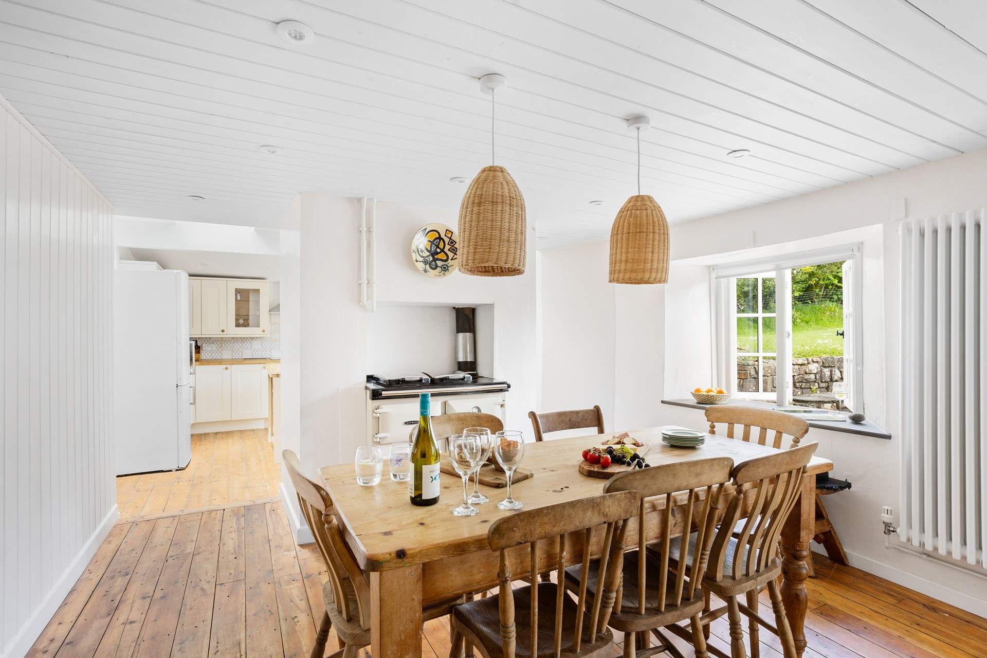 Plenty of room for everyone around the dining-table, making holiday meal times a real treat with a view of the garden.