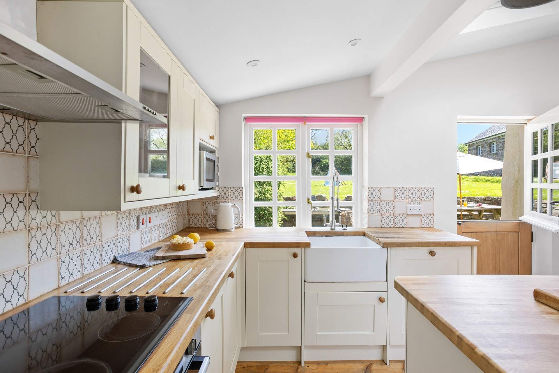 When you have a perfect view of the garden to enjoy, please note the building to the right is in the garden and is not occupied.
