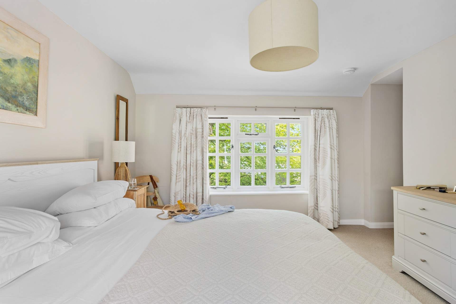 This bedroom is double aspect so floods with light.