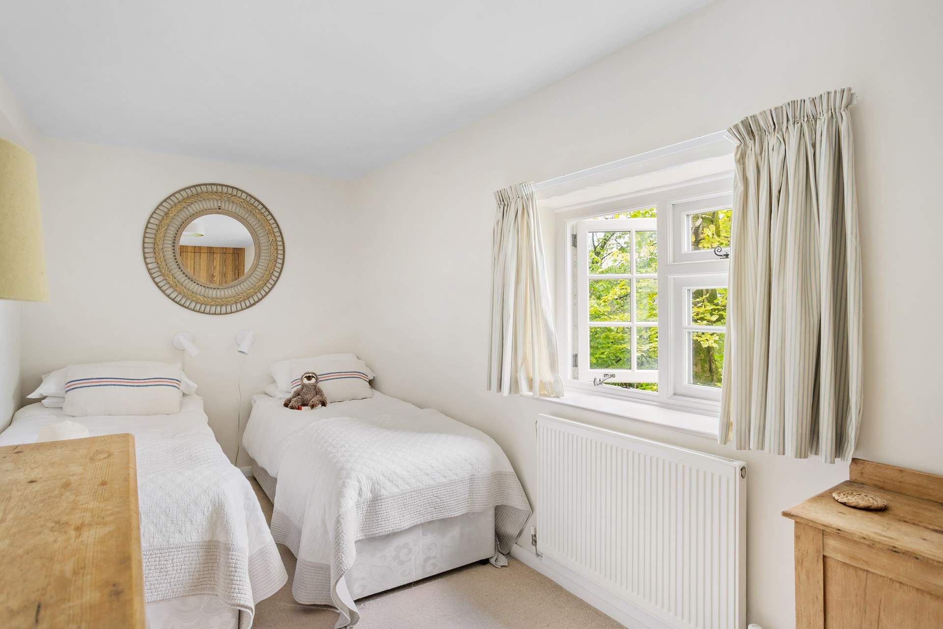 The second twin bedroom can be found at the back of the house.