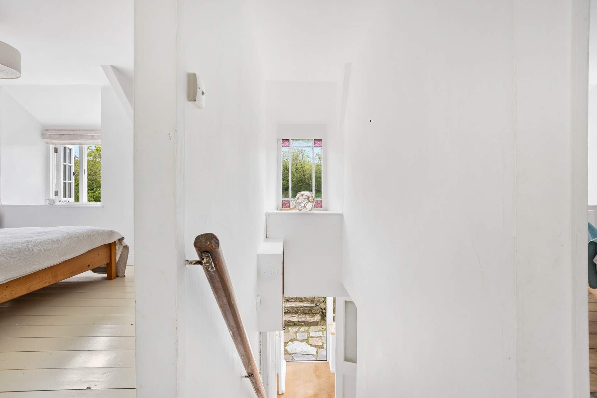 Head up the stairs to discover all four of the bedrooms. 