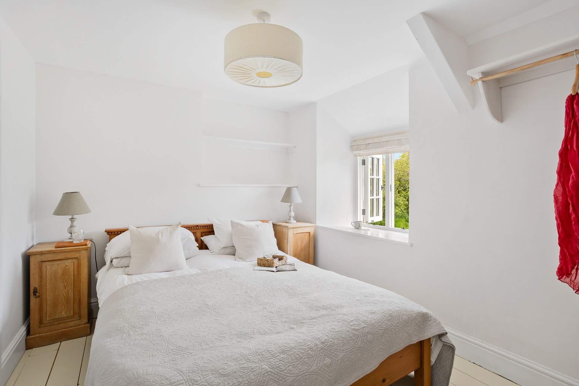 Bedroom one offers an ensuite and is calm and peaceful with views to the front of the cottage.