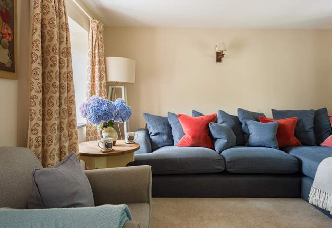 There is plenty of space to snuggle into the sofa and enjoy a film night.