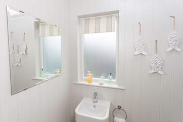 The en suite is tastefully decorated.