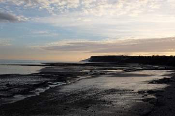 Go to the local pub and watch the sun set over Culver Down.