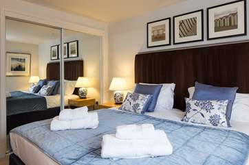 Bedroom 2 with colourful decoration throughout.