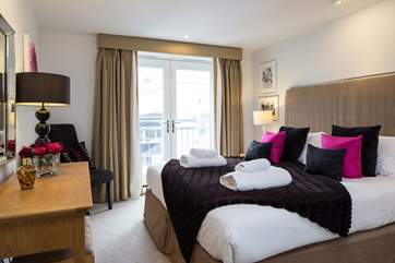 Bedroom 1 boasts a fabulous super-king size bed which can be made up as twin beds.