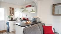 There is a contemporary kitchen which is well-equipped so you can make all your tasty meals whilst on holiday, just bring your favourite food!