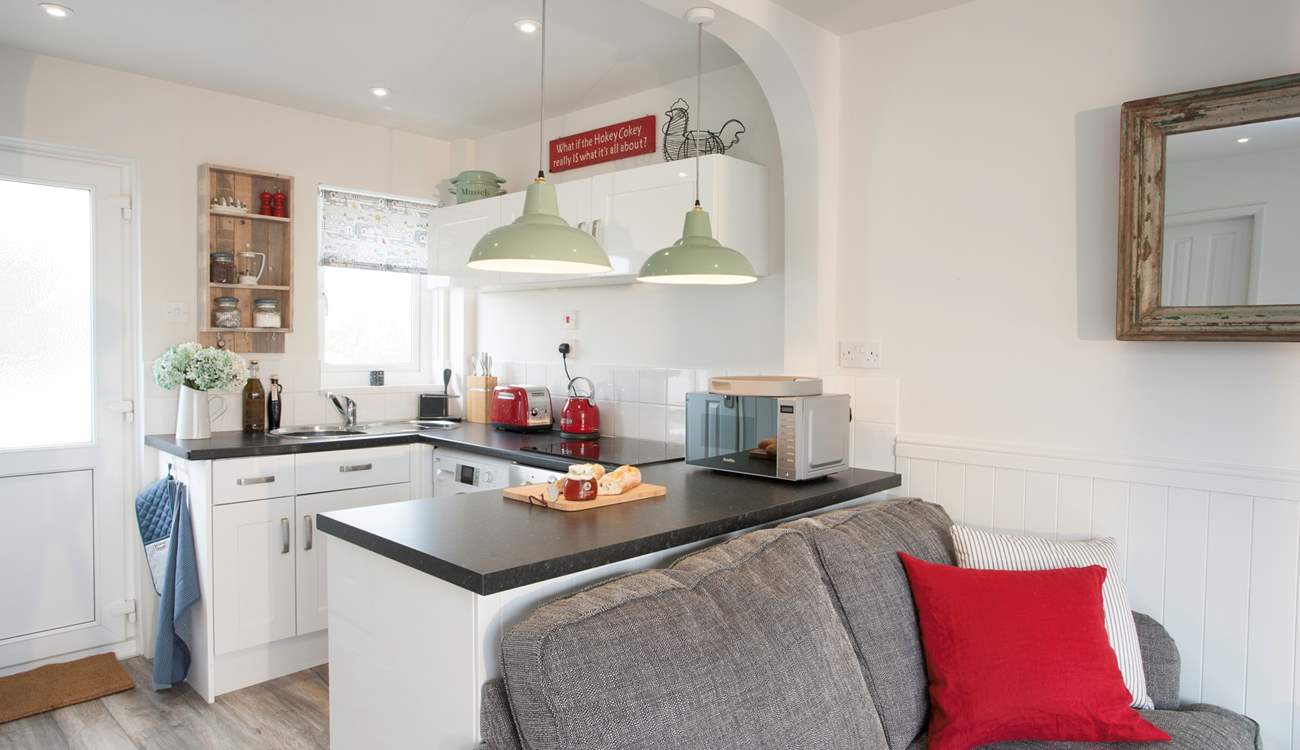 There is a contemporary kitchen which is well-equipped so you can make all your tasty meals whilst on holiday, just bring your favourite food!