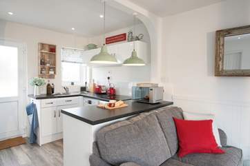 There is a contemporary kitchen which is well-equipped so you can make all your tasty meals whilst on holiday, just bring your favourite food!