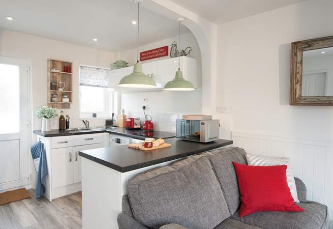 There is a contemporary kitchen which is well-equipped so you can make all your tasty meals whilst on holiday, just bring your favourite food!