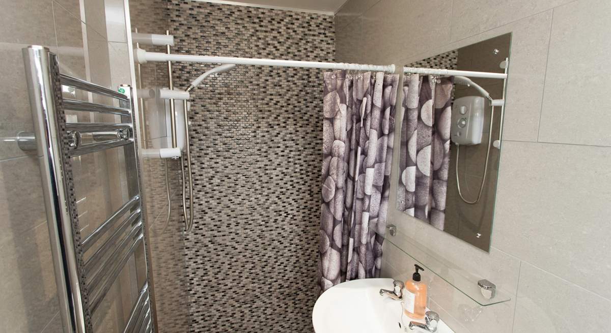 The bungalow has a modern new shower-room.