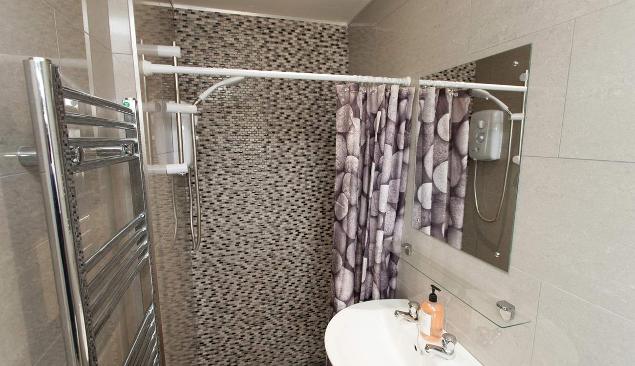The bungalow has a modern new shower-room.