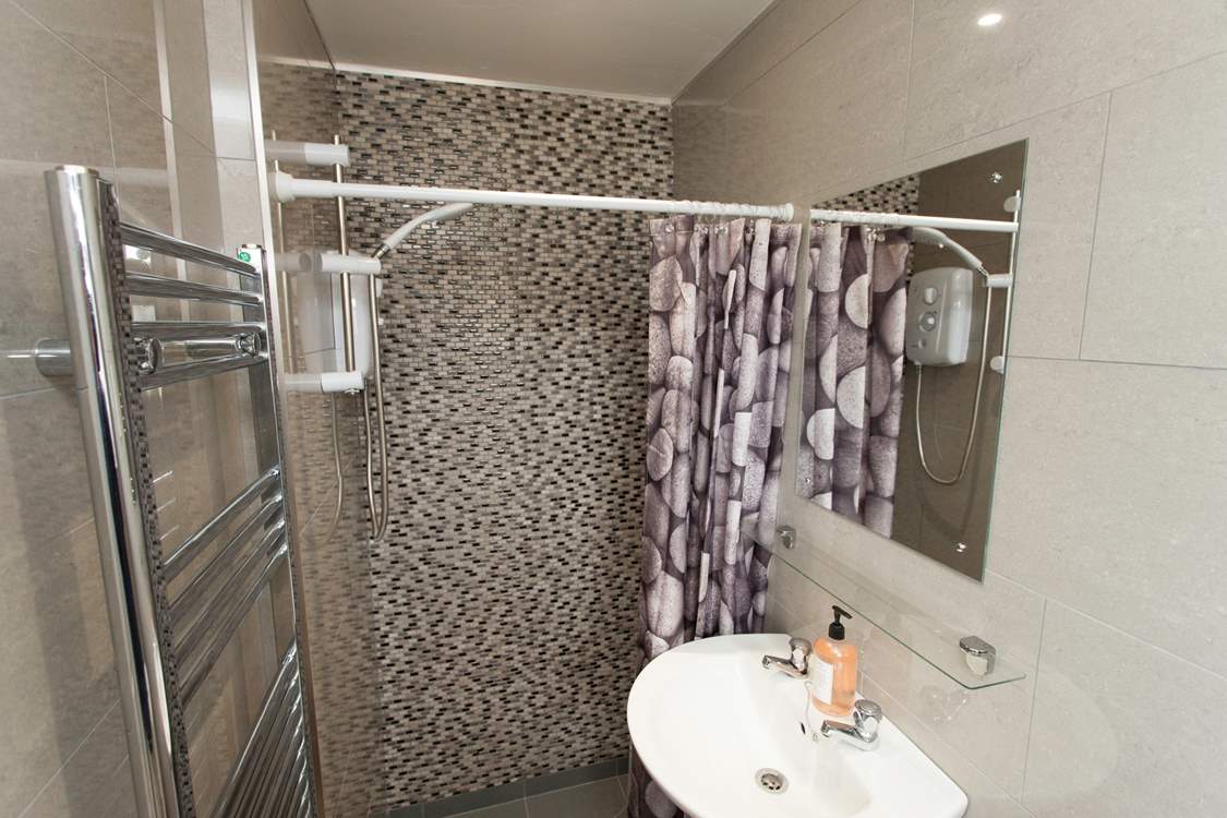 The bungalow has a modern new shower-room.