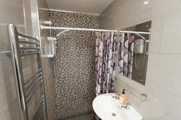 The bungalow has a modern new shower-room.