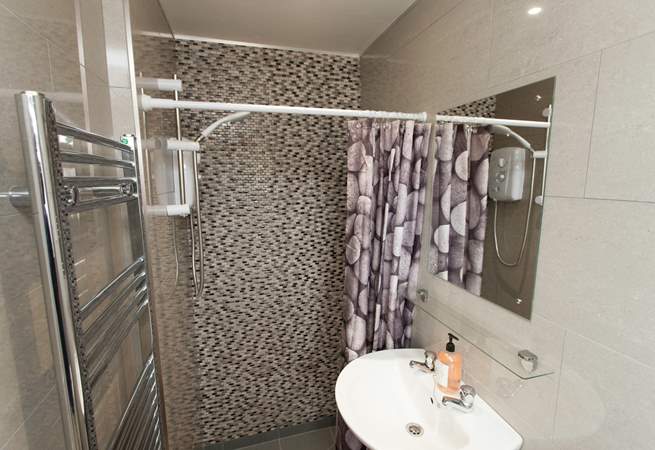 The bungalow has a modern new shower-room.
