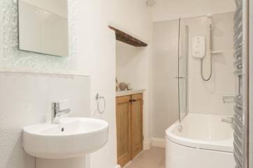 The stylish bathroom is on the first floor.