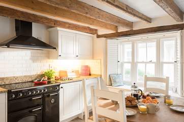 If you like to eat at home, this well-equipped kitchen with large range is a cook's dream.