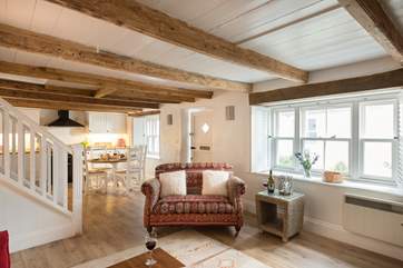 Looking across the open plan living-room towards the kitchen-area.