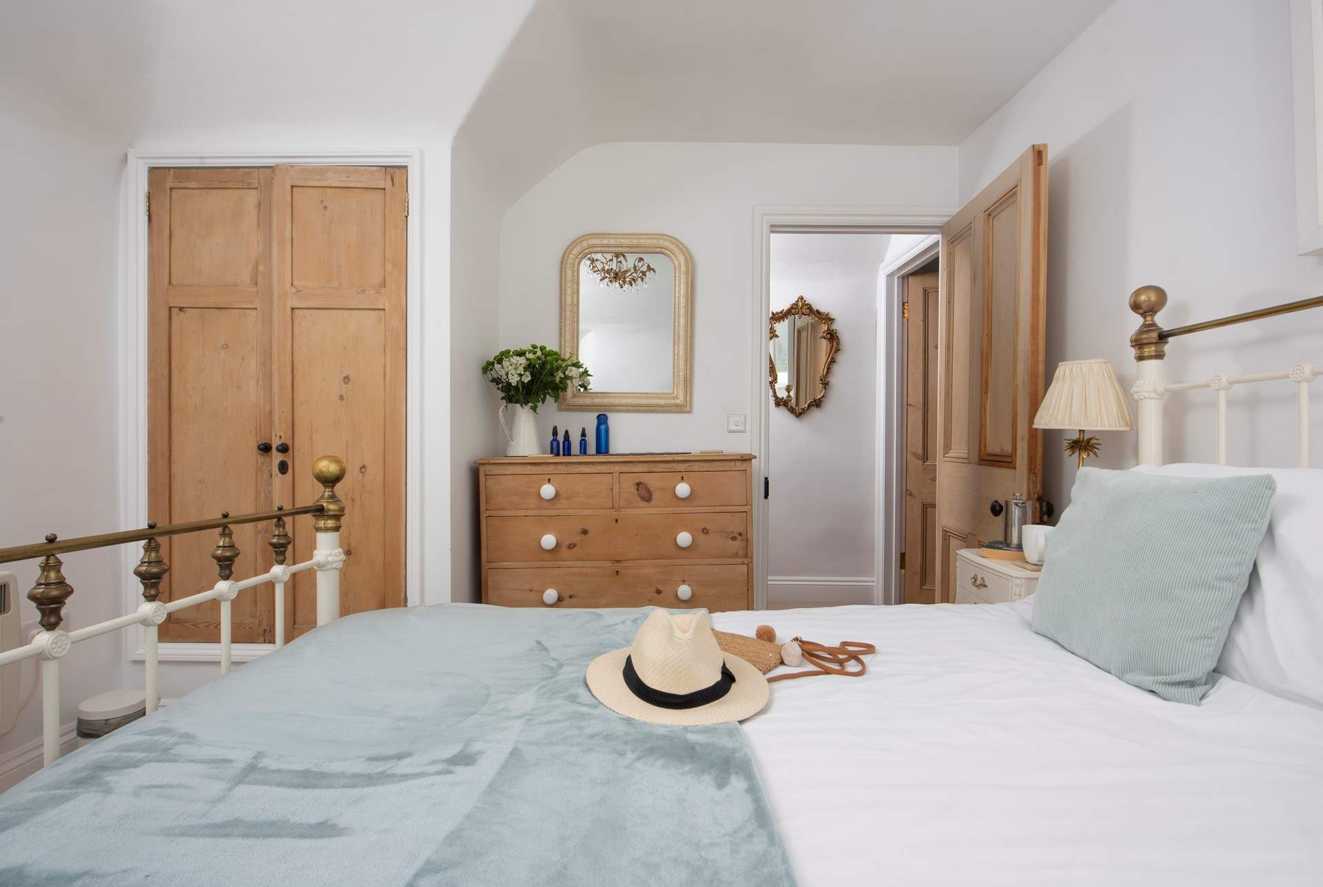 Bedroom 1 with king-size bed and views down to the harbour.