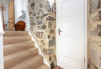 Exposed Cornish granite at the back of the cottage.