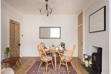 Original Ercol furniture is a lovely feature in the dining-room.