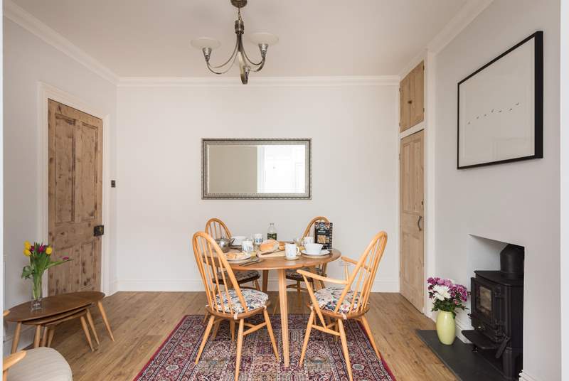 Original Ercol furniture is a lovely feature in the dining-room.