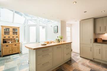 The glazed end of the kitchen/breakfast-room brings in plenty of light.