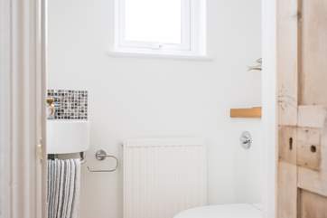There is a separate cloakroom next to the shower-room.