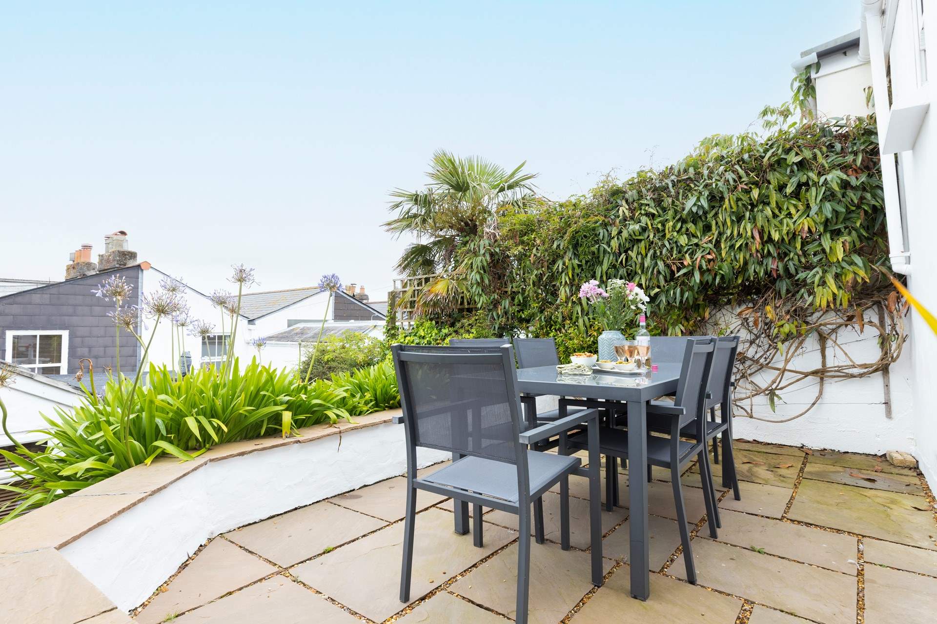 The pretty private patio is a lovely spot to relax. 