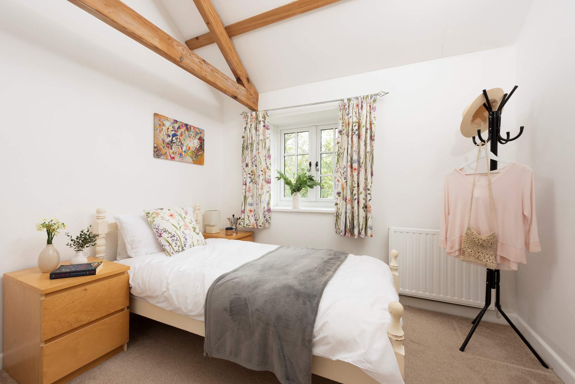 Twin beds await in the second bedroom.