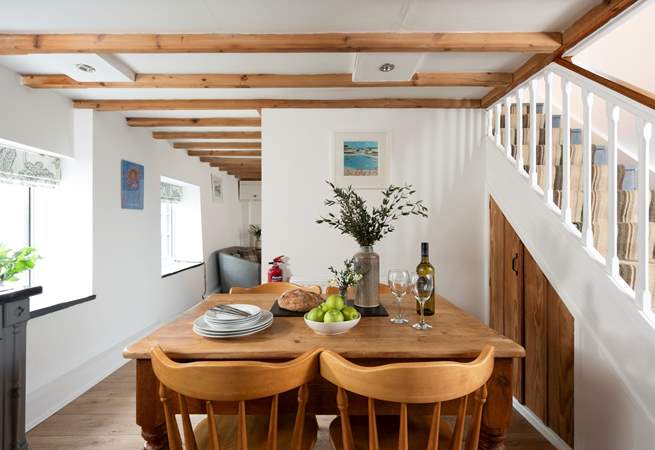 Gather around the dining table to chat about the adventures of the day. 
