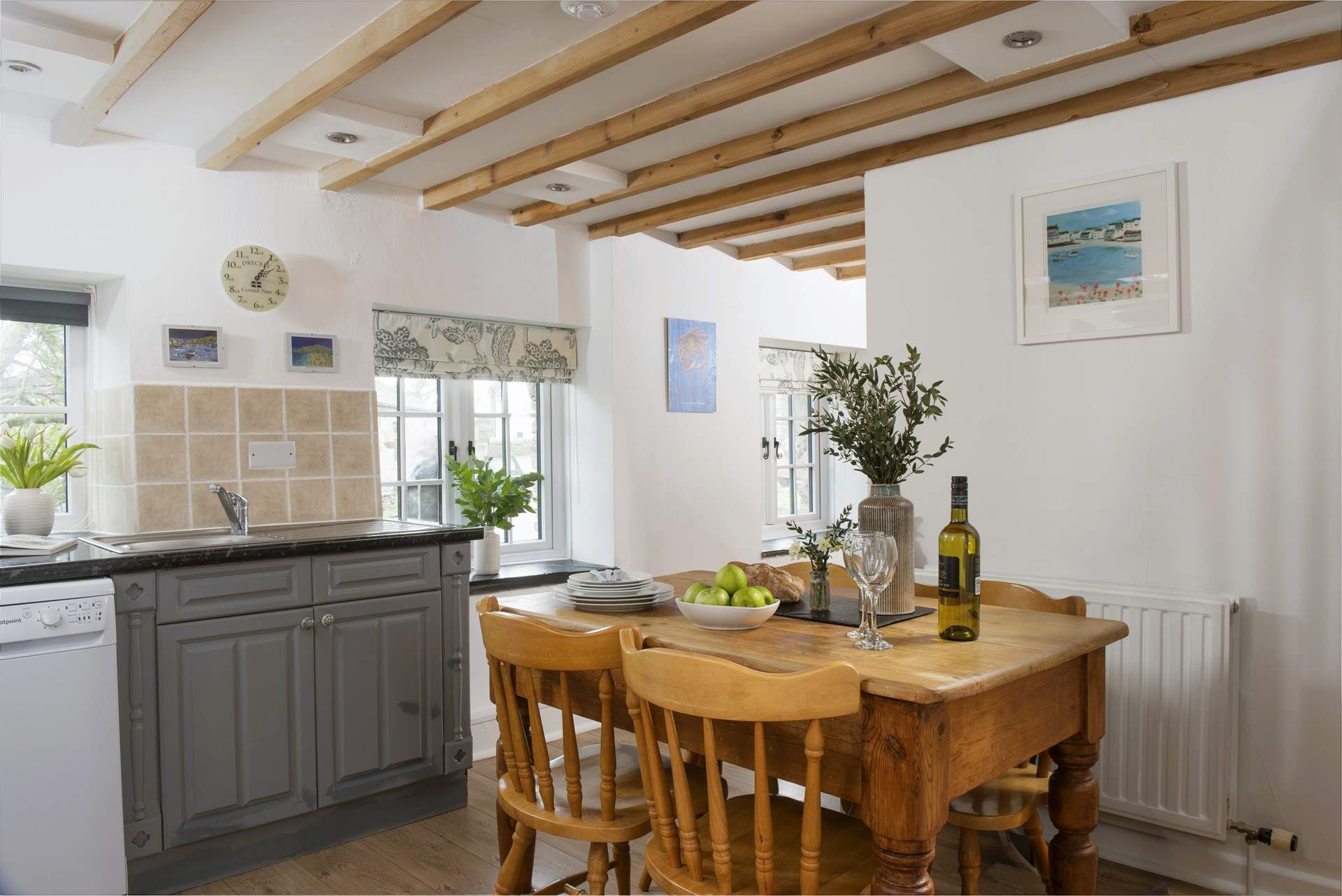 The pretty country style kitchen dining room.