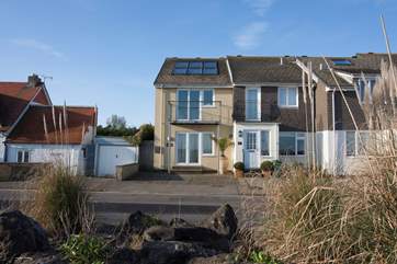 Situated steps away from the beach, Shore House is a stunning three bedroom house right by the sea
