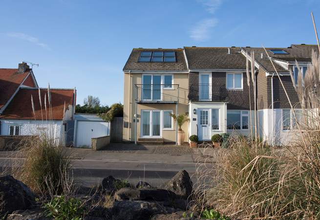 Situated steps away from the beach, Shore House is a stunning three bedroom house right by the sea