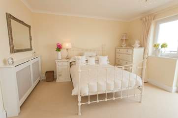 The double bedroom on the first floor has patio doors out to a balcony with stunning views over the solent