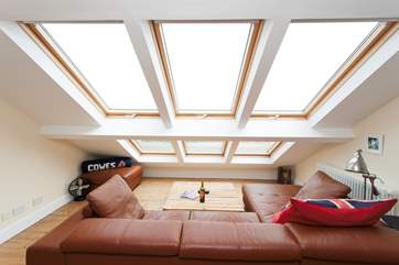 Grab a glass of wine, cuddle up on the sofa and watch the ships sail by, the waves crash up on the beach and view of Portsmouth beyond the sea out of the stunning picture window (restricted head heigh