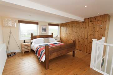 The master bedroom has a kingsize bed, to spread out, snuggle under the covers and get a good nights sleep in