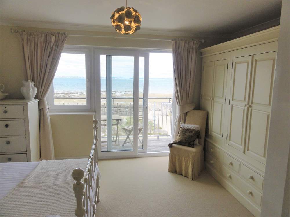 Views of the Solent from the bedroom, leading out to the Balcony