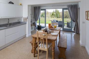 Step out of the kitchen-area, straight onto the beautiful patio, and prepare to be greeted by the most stunning surroundings.