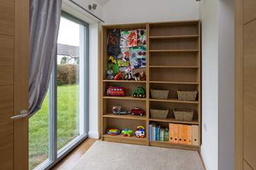 Delightful playroom for the smaller members of the group. Nicely linked to the living area and the kitchen via inter-connecting doors.