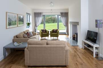 The sitting-room has a very inviting wood-burner for those colder evenings.