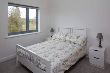 Bedroom 2, double bed with TV.
