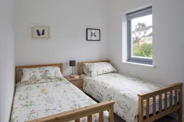 Bedroom 3, large twin beds making this the perfect room for anyone in the party.
