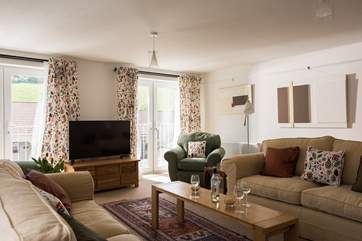 Beautiful Ercol furniture adds a vintage mid-century vibe.
